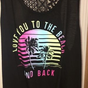 A black tank with a beach design
